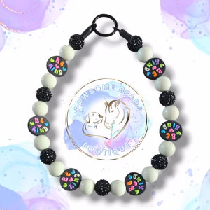 Beaded dog collar made from 20mm round acrylic beads featuring Be Kind silicone feature beads.