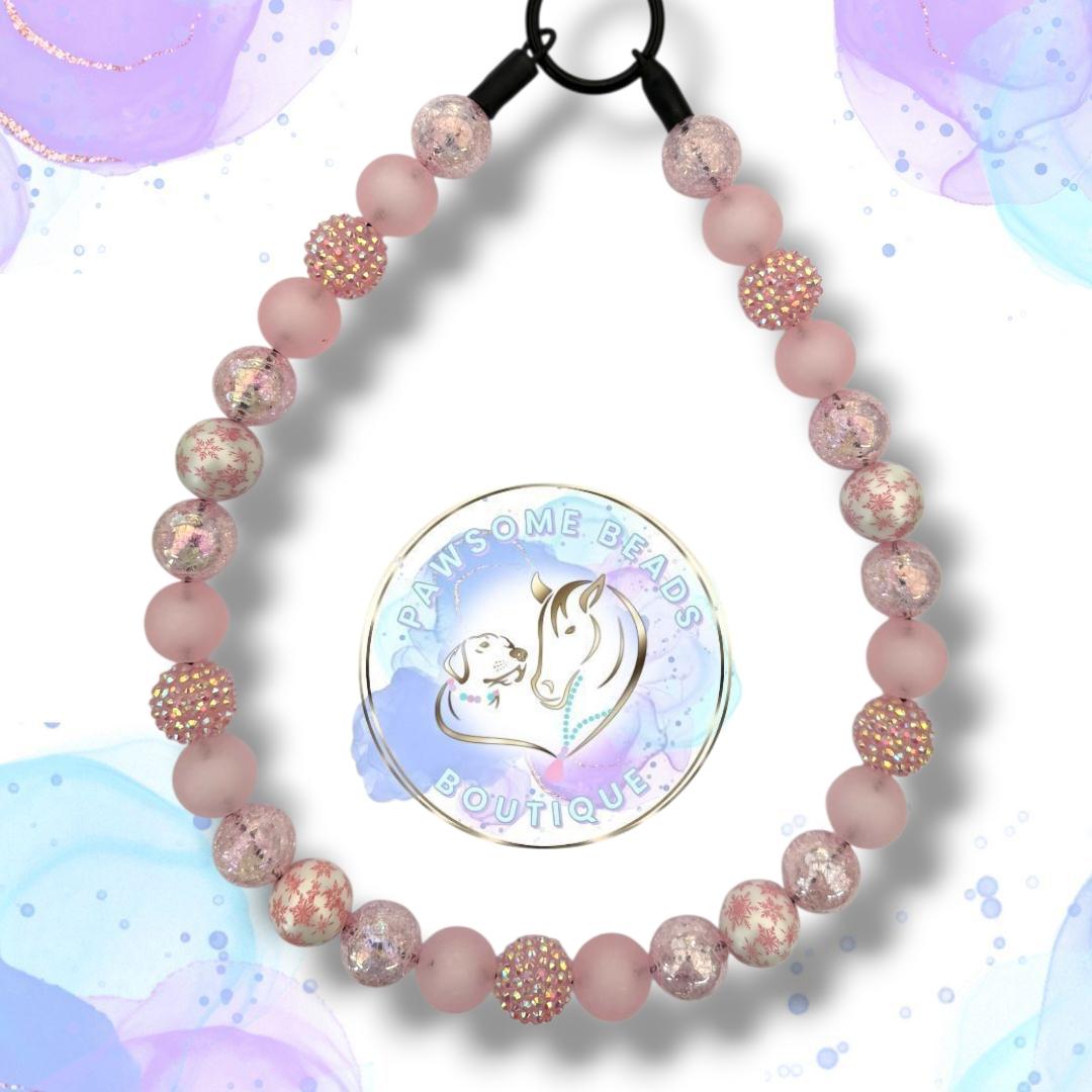 Christmas beaded dog collar from Pawsome Beads Boutique. Features a pink snowflake beads