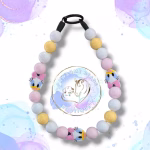 Beaded dog collar from Pawsome Beads Boutique made from 20mm acylic beads in blue white and yellow colours featuring daisy duck feature beads