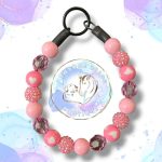 Pink beaded dog collar from Pawsome Beads Boutique made with 16mm acrylic beads