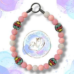 Handmade Queen of Beads dog collar featuring a bold crown statement bead and vibrant acrylic beads in fuchsia pink, turquoise and plum tones. A fun, stylish beaded collar designed for dogs who love to stand out. Perfect for fashionable pups and everyday royal walks.