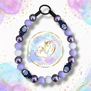 Sister Sinister purple Halloween beaded dog collar with lavender, plum, white sparkling beads and creepy nun-inspired character focal beads.